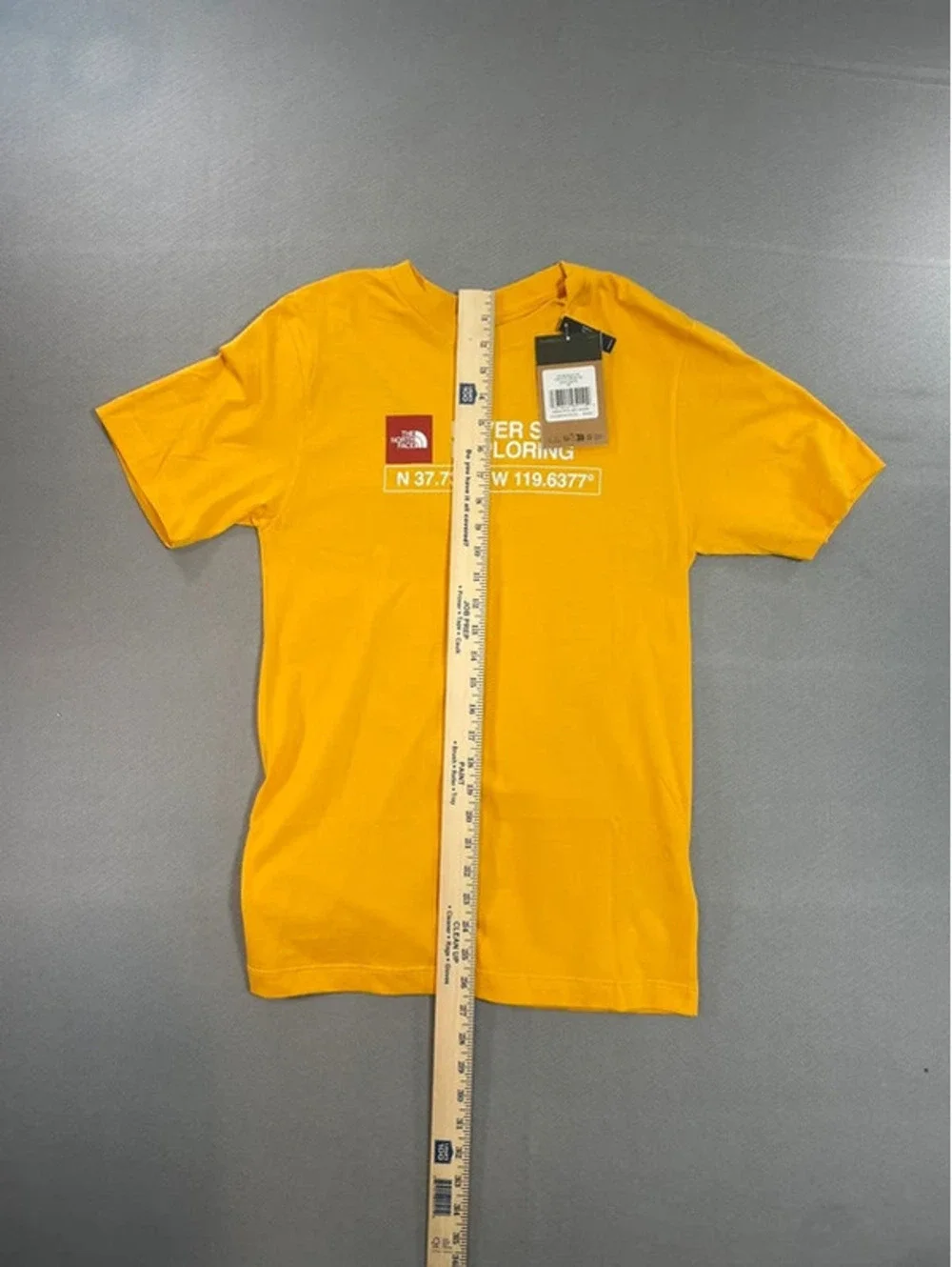 The Northface yellow “Never stop exploring” T-shirt Size XS - Picture 7 of 7